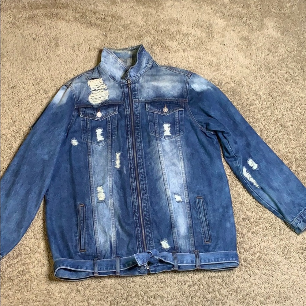 Distressed blue jean jacket with belt